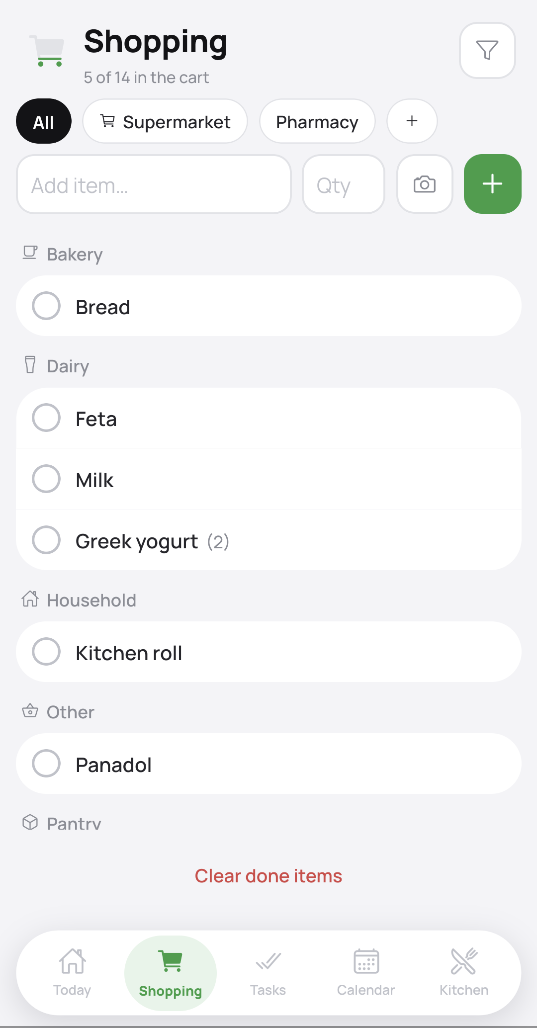 The shopping list grouped into bakery, dairy and household, with Supermarket and Pharmacy shop filters